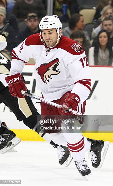 Paul Bissonnette of the Phoenix Coyotes skates against the Pittsburgh Penguins during the game at Consol Energy Center on March 25, 2014 in...