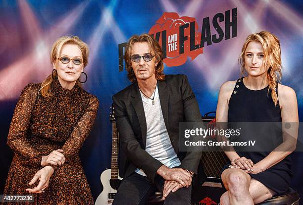 Meryl Streep, Rick Springfield, and Mamie Gummer attend the 'Ricki And The Flash' cast photo call at Ritz Carlton Hotel on August 2, 2015 in New York...