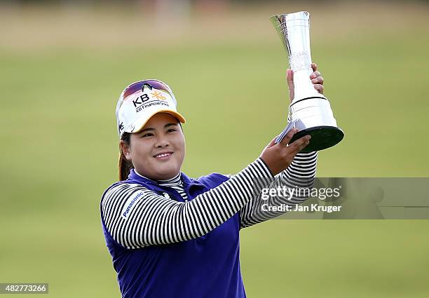 Inbee Park of South Korea poses with the trophy following her victory during the Final Round of the Ricoh Women's British Open at Turnberry Golf Club...