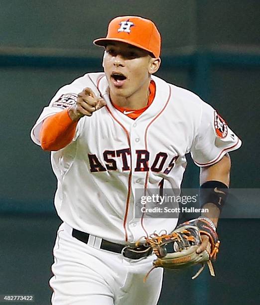 Carlos Correa of the Houston Astros reacts to a play in the second inning during their game against the Arizona Diamondbacks at Minute Maid Park on...