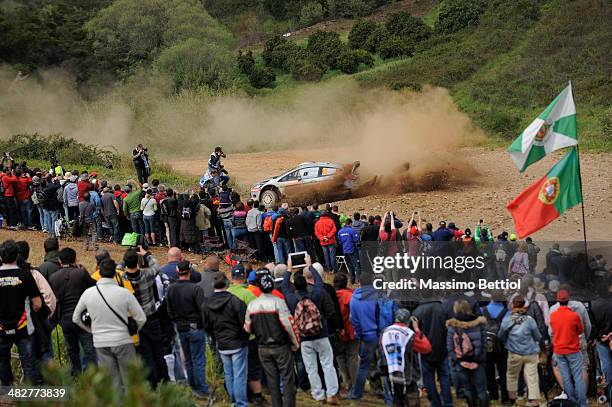 Henning Solberg of Norway and Ilka MInor of Austrian compete in their Ford Fiesta R5 during Day One of the WRC Portugal on April 4, 2014 in Faro,...