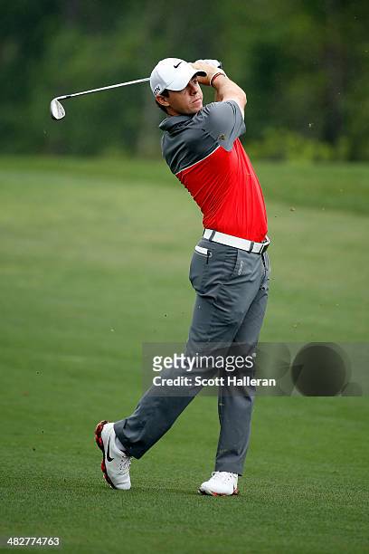 Rory McIlroy of Northern Ireland watches a shot on the sixth hole during round one of the Shell Houston Open at the Golf Club of Houston on April 3,...