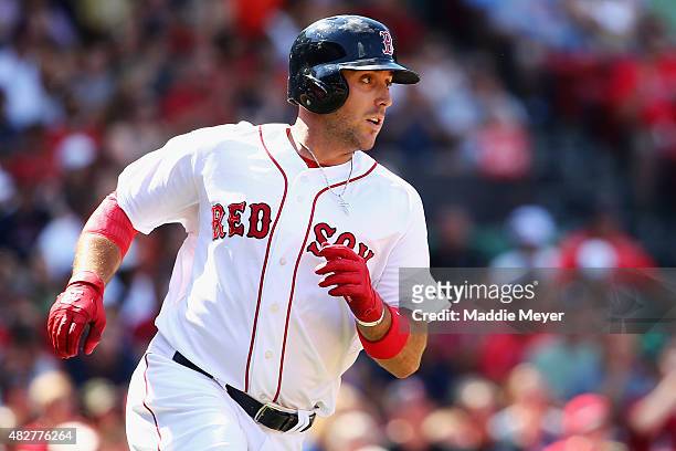 Travis Shaw of the Boston Red Sox runs to first during the sixth inning against the Tampa Bay Rays at Fenway Park on August 2, 2015 in Boston,...