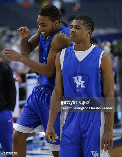 Kentucky Wildcats guard/forward James Young jokes around with Kentucky Wildcats guard Aaron Harrison right, in preparation for the NCAA Final Four at...