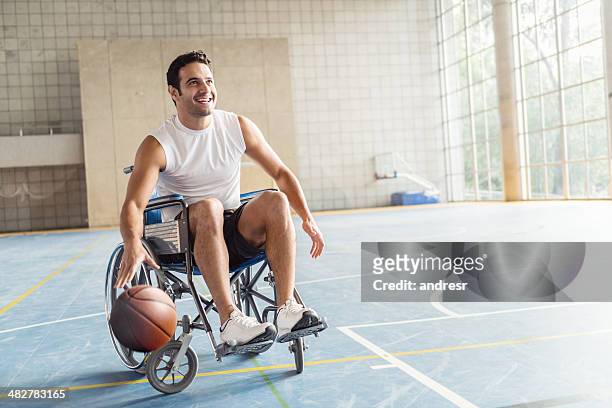 basketball player in wheelchair - basketball sport stock-fotos und bilder