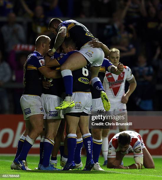Kallum Watkins of Leeds Rhinos is congratulated by his team-mates after going over for a try during the Ladbrokes Challenge Cup Semi-Final match...