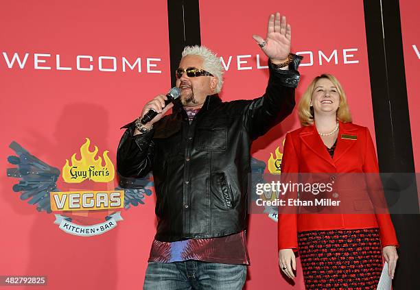 Chef and television personality Guy Fieri and Regional President of The Quad Resort & Casino Eileen Moore speak to guests during a welcome event for...