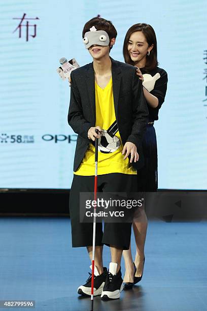 Actor/singer Lu Han and actress Yang Mi attend film "The Witness" press conference on August 2, 2015 in Beijing, China.