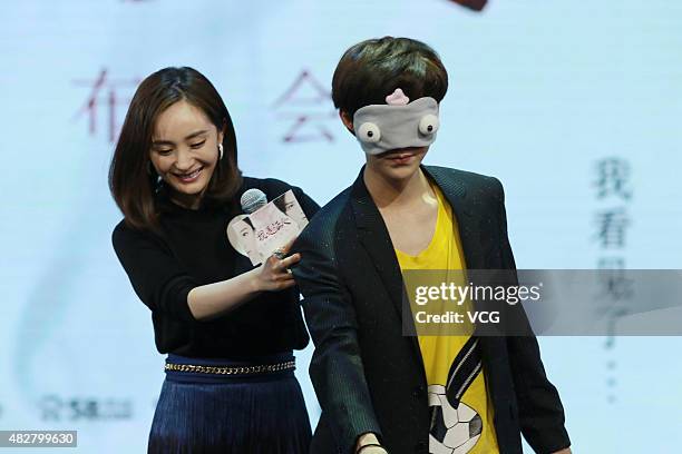 Actor/singer Lu Han and actress Yang Mi attend film "The Witness" press conference on August 2, 2015 in Beijing, China.