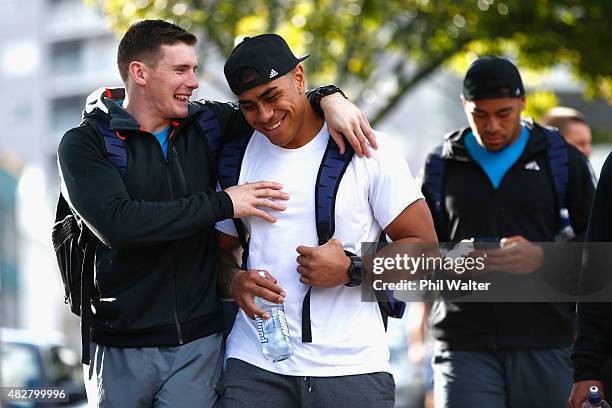 Colin Slade and Malakai Fekitoa of the All Blacks arrive for a New Zealand All Blacks gym session at Les Mills Gym on Victoria Street on August 3,...