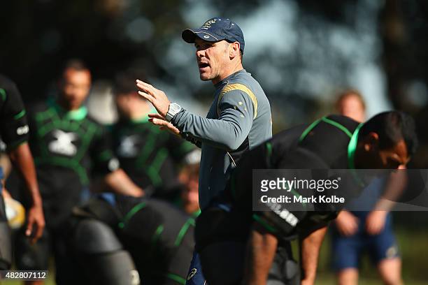 Wallabies assistant coach Nathan Grey shouts instructions during the Australian Wallabies training session at Kippax Lake on August 3, 2015 in...