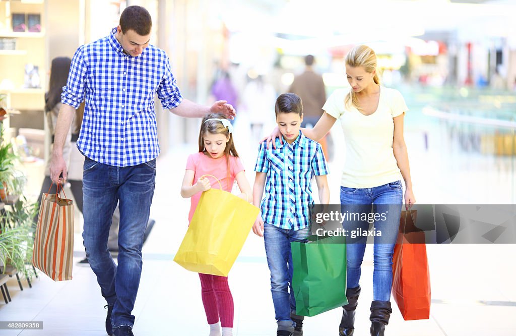 Family in shopping mall.