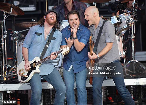 Musicians James Young, Mike Eli and Jon Jones of Eli Young Band perform onstage during the AT&T Block Party at NCAA March Madness Music Festival -...