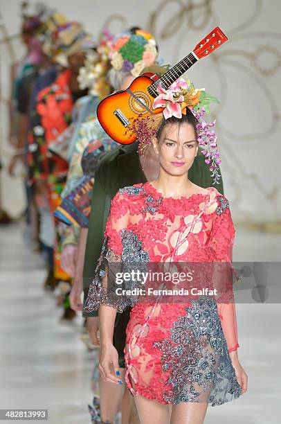 Modes walk the runway during Amapo show at Sao Paulo Fashion Week Summer 2014/2015 at Parque Candido Portinari on April 4, 2014 in Sao Paulo, Brazil.