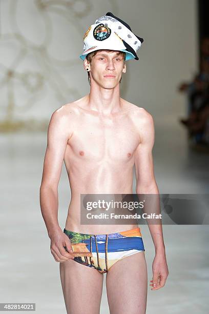 Model walks the runway during Amapo show at Sao Paulo Fashion Week Summer 2014/2015 at Parque Candido Portinari on April 4, 2014 in Sao Paulo, Brazil.