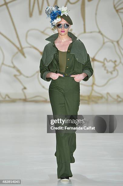 Model walks the runway during Amapo show at Sao Paulo Fashion Week Summer 2014/2015 at Parque Candido Portinari on April 4, 2014 in Sao Paulo, Brazil.