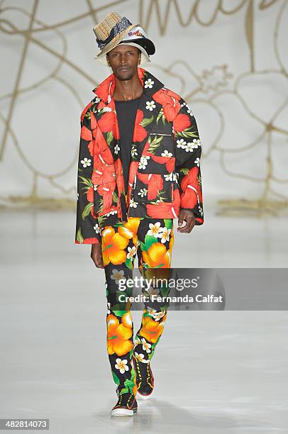 Model walks the runway during Amapo show at Sao Paulo Fashion Week Summer 2014/2015 at Parque Candido Portinari on April 4, 2014 in Sao Paulo, Brazil.