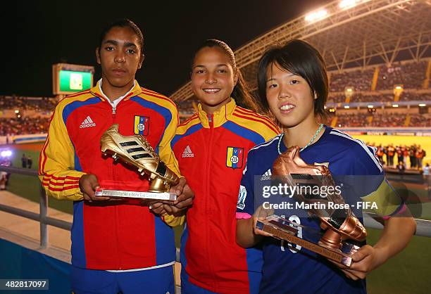 Deyna Castellanos and Gabriela Garcia of Venezuela pose with the adidas Golden Boot and Hina Sugita pose with the adidas Bronze Boot during the FIFA...