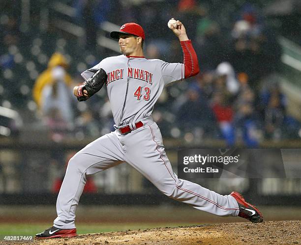 Manny Parra of the Cincinnati Reds delivers a pitch in the 8th inning against the New York Mets on April 4, 2014 at Citi Field in the Flushing...