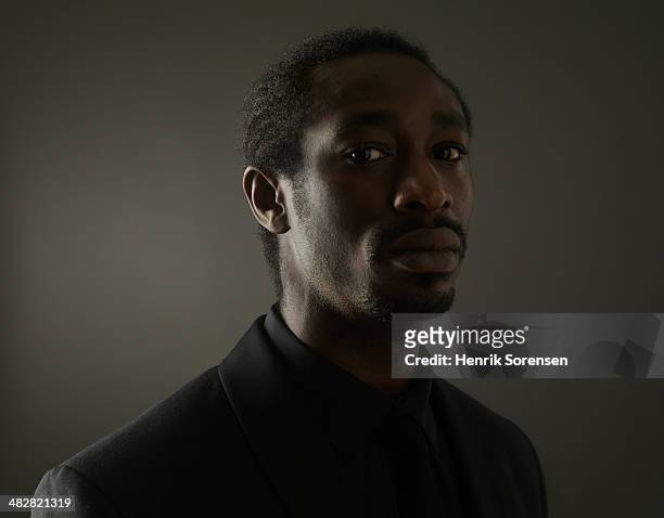portrait of a black man on a dark background - formal portrait serious stock pictures, royalty-free photos & images