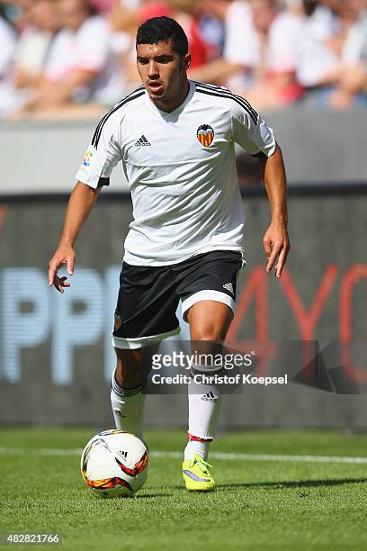 Zakaria Bakkali of Valencia runs with the ball during the Colonia Cup 2015 match between 1. FC Koeln and FC Valencia at RheinEnergieStadion on August...