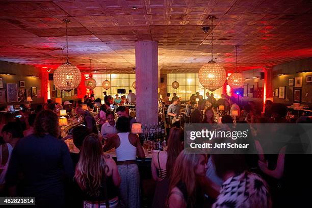 Guests enjoy Neon Gold Wrap Party @ Soho House Chicago with BACARDI on August 2, 2015 in Chicago, Illinois.