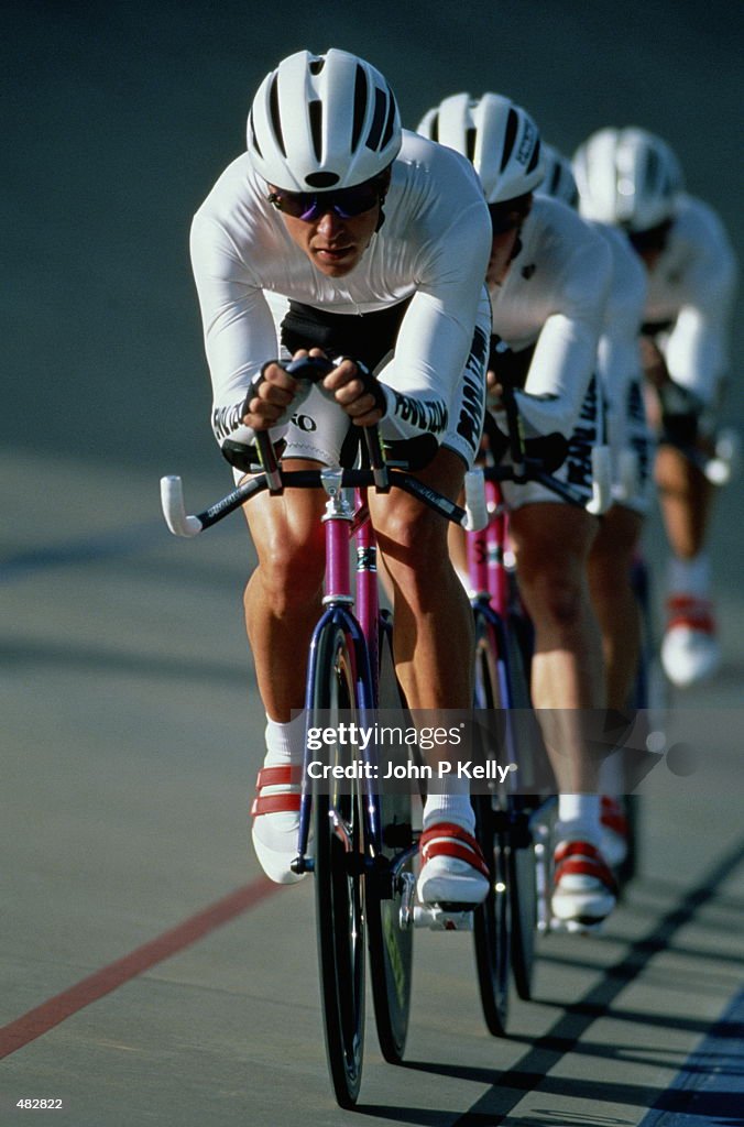 TEAM CYCLISTS ALIGNED ON TRACK