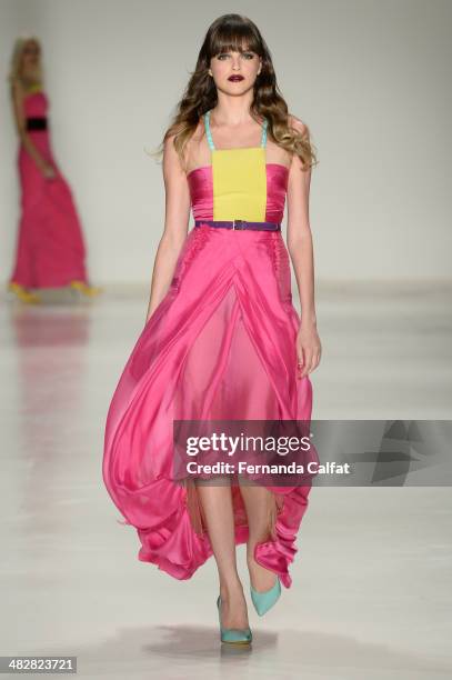 Agatha Moreira walks the runway during Samuel Cirnansck show at Sao Paulo Fashion Week Summer 2014/2015 at Parque Candido Portinari on April 4, 2014...