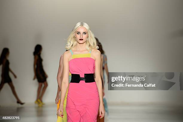 Models walk the runway during Samuel Cirnansck show at Sao Paulo Fashion Week Summer 2014/2015 at Parque Candido Portinari on April 4, 2014 in Sao...