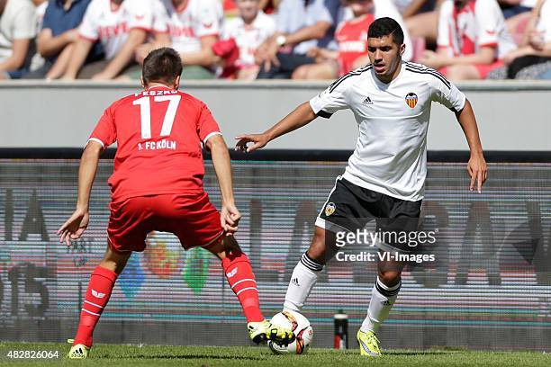 Slawomir Peszko of 1 FC Koln, Zakaria Bakkali of Valencia CF during the Colonia Cup match between 1. FC Koln and Valencia on August 2, 2015 at the...