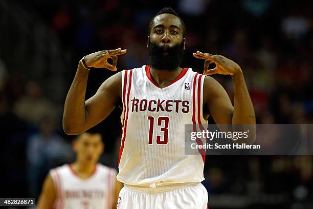 James Harden of the Houston Rockets celebrates after hitting a 25 foot three pointer in the fourth period against the Oklahoma City Thunder during a...