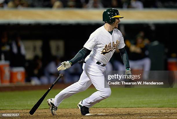 Jed Lowrie of the Oakland Athletics bats against the Cleveland Indians in the bottom of the seventh inning at O.co Coliseum on April 2, 2014 in...