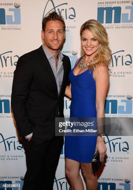 Television personality and former soccer player Juan Pablo Galavis and television personality Nikki Ferrell arrive at the 13th annual Michael Jordan...