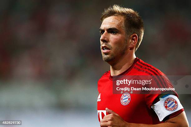 Philipp Lahm of Bayern Muenchen looks on during the DFL Supercup match between VfL Wolfsburg and FC Bayern Muenchen at Volkswagen Arena on August 1,...
