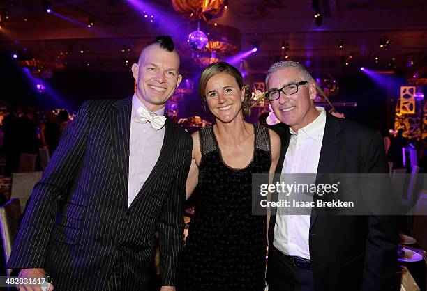 No Doubt drummer Adrian Young, soccer player and broadcaster Brandi Chastain, and husband Jerry Smith attend the 13th annual Michael Jordan Celebrity...
