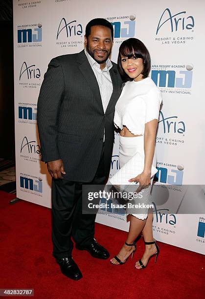 Former National Football League player Jerome Bettis and wife Trameka Boykin arrive at the 13th annual Michael Jordan Celebrity Invitational gala at...