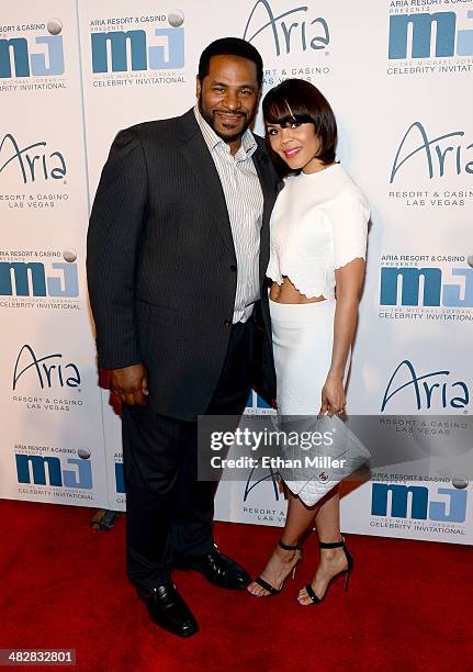 Former National Football League player Jerome Bettis and wife Trameka Boykin arrive at the 13th annual Michael Jordan Celebrity Invitational gala at...