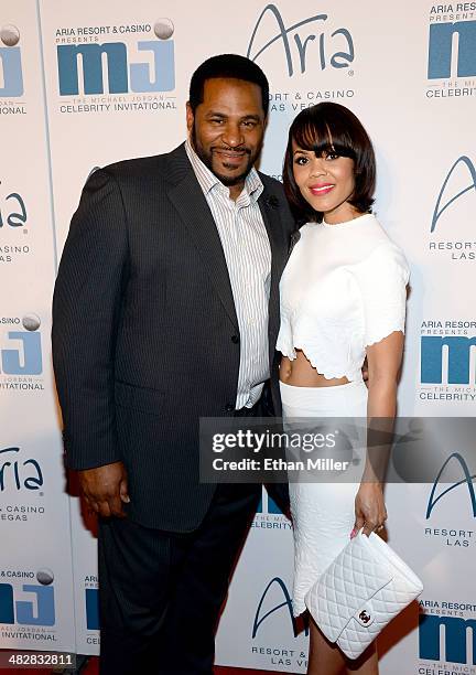 Former National Football League player Jerome Bettis and wife Trameka Boykin arrive at the 13th annual Michael Jordan Celebrity Invitational gala at...