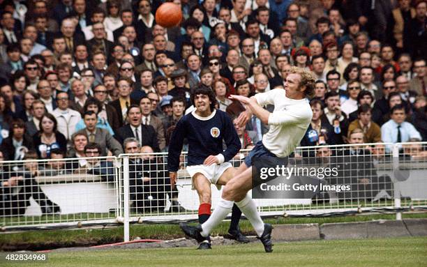 Bobby Moore Rangers England captain Bobby Moore challenges Scotland player Peter Cormack ...