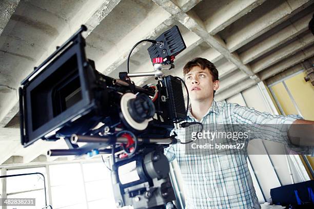 filming - film director stock pictures, royalty-free photos & images