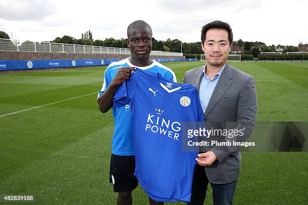 New signing N'Golo Kante of Leicester City is unveiled at Belvoir Drive Training Ground on August 3 pictured with vice chairman Aiyawatt...