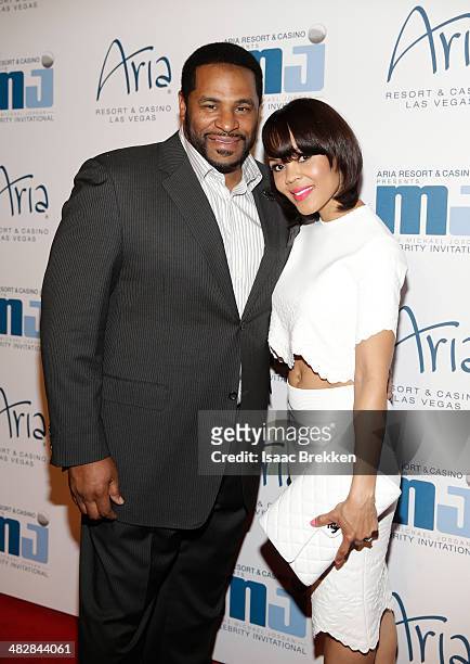 Former National Football League player Jerome Bettis and wife Trameka Boykin arrive at the 13th annual Michael Jordan Celebrity Invitational gala at...