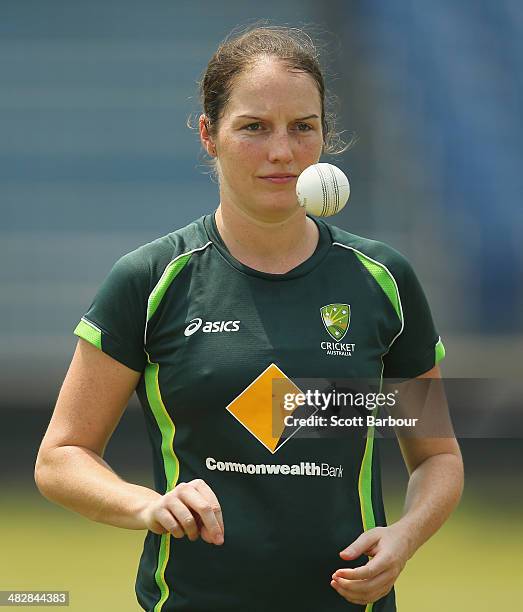 Rene Farrell of Australia prepares to bowl during an Australia Women's nets session ahead of the ICC World Twenty20 Bangladesh 2014 Womens Final at...