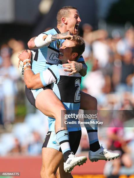 Nathan Stapleton of the Sharks celebrates his 4th try with team mate Todd Carney during the round five NRL match between the Cronulla-Sutherland...