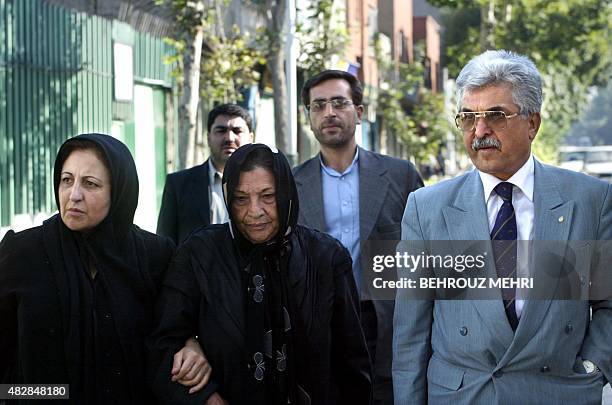 Iranian Ezzat Kazemi , mother of Zahra Kazemi, and her lawyers Shirin Ebadi , Mohammad Seifzadeh and Abdolfattah Soltanifar arrive at Tehran's...