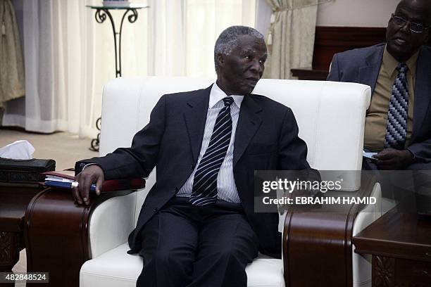 Former South African President Thabo Mbeki meets with Sudanese President Omar al-Bashir at the Presidential palace in Khartoum on August 3, 2015. AFP...