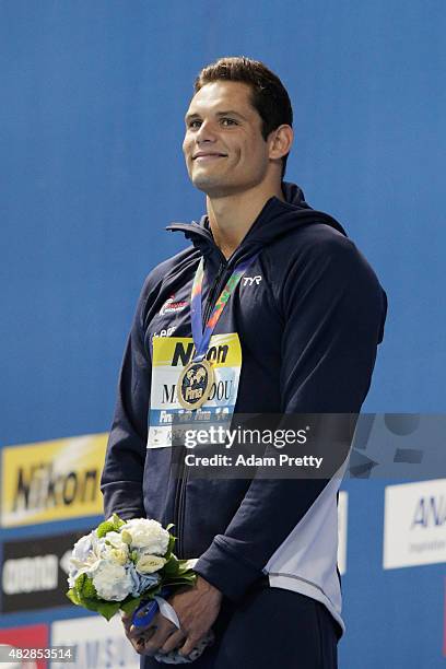 Gold medalist Florent Manaudou of France poses during the medal ceremony for the Men's 50m Butterfly on day ten of the 16th FINA World Championships...