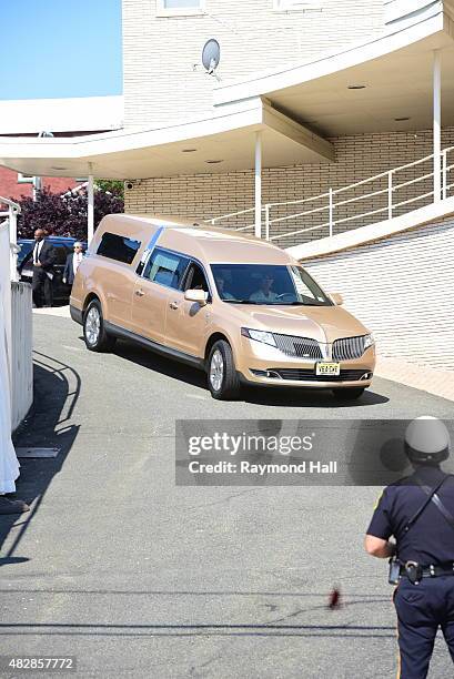 The hearse carrying the body of Bobbi Kristina Brown arrives at Whigham Funeral Homem for a funeral service on August 3, 2015 in Westfield, New...