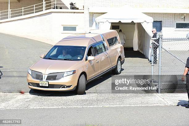 The hearse carrying the body of Bobbi Kristina Brown arrives at Whigham Funeral Homem for a funeral service on August 3, 2015 in Westfield, New...