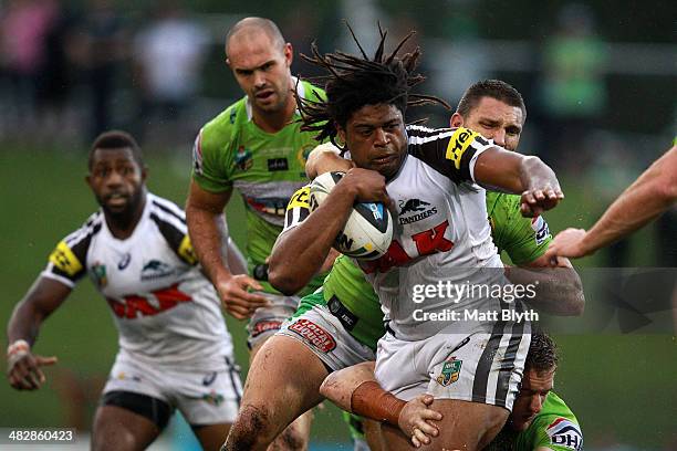 Jamal Idris of the Panthers is tackled during the round five NRL match between the Penrith Panthers and Canberra Raiders at Sportingbet Stadium on...